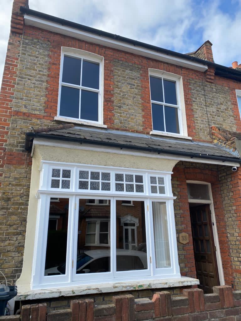 Full sash window restoration and casement window project after image