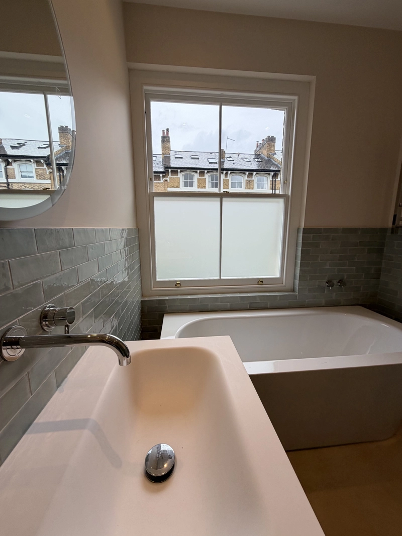Timber sash window with frosted glass