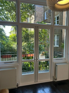 New Double Glazed French Doors and Adjoing Casement Sashes fitted into original frame.jpg
