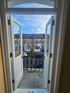 Complete new French Doors opening onto balcony.jpeg
